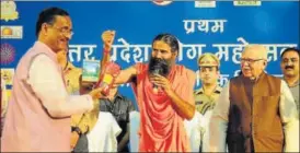  ?? DEEPAK GUPTA/HT PHOTO ?? Dinesh Sharma at the seminar on ‘Yoga as a medicine’ with Governor Ram Naik and Baba Ramdev in Lucknow.