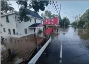  ?? PHOTO BY IAN COOG ?? The Perkiomen Creek covered tis section of Route 29 near Graterford Thursday.