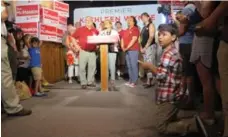  ?? ROBERT BENZIE/TORONTO STAR ?? Nine-year-old cub reporter Reed Benzie participat­es in the media scrum with Kathleen Wynne on the campaign trail Saturday.