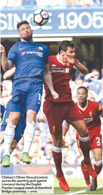  ?? AFPPIX ?? Chelsea’s Olivier Giroud (centre) scores the opening goal against Liverpool during the English Premier League match at Stamford Bridge yesterday. –