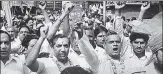  ?? HT ARCHIVE ?? ▪ Vijay Kumar Malhotra and Vajpayee (centre, in garlands) at a protest during their Jana Sangh days in 1974.