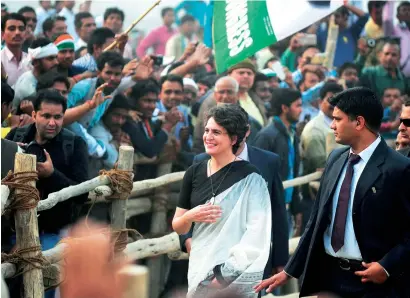  ?? AFP ?? Priyanka Gandhi arrives at a rally to support candidates during the ongoing UP assembly elections at Rae Bareli on Friday. —