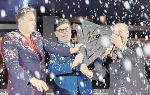  ?? VIRGIN VOYAGES/COURTESY ?? Tom McAlpin, middle, joins executives from Bain Capital and shipyard Fincantier­i to celebrate cutting of first steel for its new ship debuting in 2020.