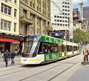  ?? ?? Trams, both in Sydney and Melbourne, connect inner CBD areas. Though slowmoving, they are an easy way to bypass the traffic.