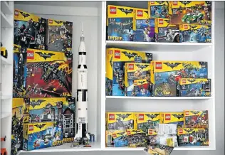  ??  ?? SPOILT FOR CHOICE: Botha has the entire Lego ‘Batman’ series which are still in unopened boxes on his shelf