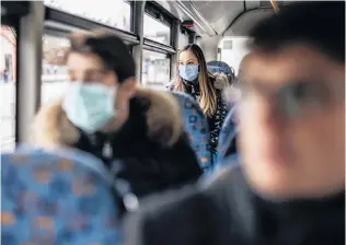  ?? PHOTO: GETTY IMAGES ?? Wearing face masks on public transport should be nonnegotia­ble.