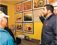  ?? NEW MEXICAN FILE PHOTO ?? Nick Peña, owner of New Mexico Food Tours, guides a tour group in December. The company is back offering tours under the state’s COVID-19 health guidelines.