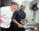  ??  ?? IN FLAMES: Shaun Munro and sous chef Prenolan Naidoo play with fire.