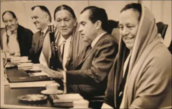  ?? WHITE HOUSE PHOTO TAKEN JULY 8, 1970. ?? From left, Jim Mirabal, Taos Pueblo Tribal Council member; Walter Hickle, Secretary of the Interior; Taos Pueblo Governor Quirino Romero; President Richard Nixon; Paul Bernal, Taos Pueblo Tribal Council secretary. Nixon and Hickle gave tribal leaders support for the tribe’s claims to Blue Lake. Nixon did not sign the bill until December 1970, after Senate approval.