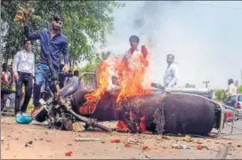  ?? PTI ?? A bike set on fire by a group of protesters in Meerut on Monday.
