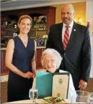  ?? SUBMITTED PHOTO ?? Margaret Chalfont, 105, poses for a photo with county Commission­ers Michelle Kichline and Terence Farrell, at the sixth annual Centenaria­n Birthday Party at the Penn Oaks Country Club hosted by the Chester County Department of Aging Services.