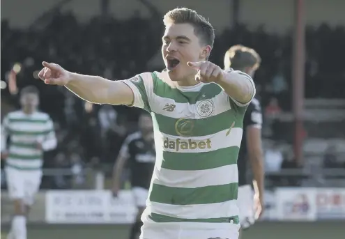  ?? PICTURE: ANDREW MILLIGAN/PA ?? 0 Celtic’s James Forrest celebrates scoring his side’s first goal in the 2-0 Boxing Day away defeat of Dundee.