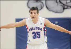  ?? Ted Rhodes/calgary Herald ?? Emmett Cook shouts out to his Winston Churchill Bobcats teammates during their game with St. Mary’s Thursday.