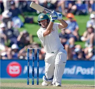  ??  ?? Australia’s Joe Burns on his way to a career-best 170 against New Zealand on Sunday. —