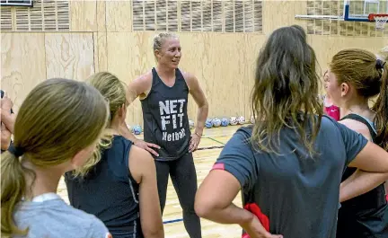 ??  ?? Silver Ferns great Laura Langman runs a schools netball coaching workshop in Christchur­ch, in March.