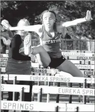  ?? Westside Eagle Observer/MIKE ECKELS ?? Decatur’s Desi Meek clears a hurdle during the March 30 Cornerston­e Bank Invitation­al Relays in Eureka Springs. Meek won the event, the 100-meter hurdles, by more than two seconds.