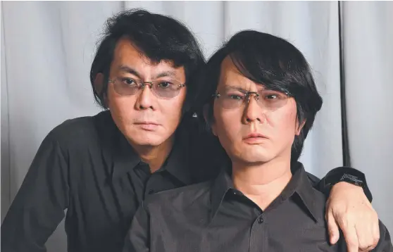  ?? Picture: OSAKA UNIVERSITY ?? Professor Hiroshi Ishiguro with his doppelgang­er robot – the professor will be a keynote speaker at a robots conference on the Gold Coast.