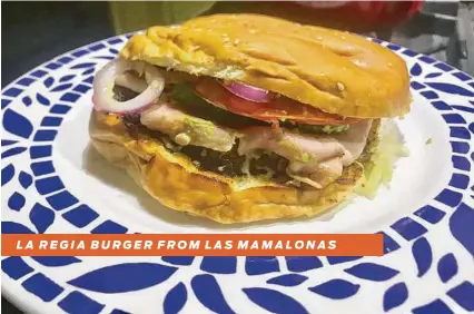  ?? Alison Cook / Staff ?? LA REGIA BURGER FROM LAS MAMALONAS