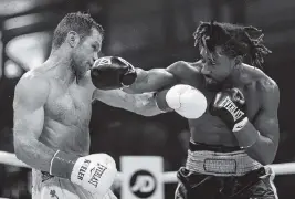  ?? MATIAS J. OCNER mocner@miamiheral­d.com ?? Demetrius Andrade, right, on the way to defeating Luke Keeler in the Meridian at Island Gardens in Miami on Jan. 30, 2020, will fight for the first time since then when he defends his title against Liam Williams on Saturday at Hard Rock Casino.