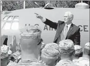  ?? AP/SHAKH AIVAZOV ?? Vice President Mike Pence greets servicemen participat­ing in a joint military exercise Tuesday outside Tbilisi, Georgia.