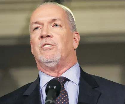  ?? CHAD HIPOLITO/THE CANADIAN PRESS/FILES ?? NDP Leader John Horgan says the B.C. Utilities Commission will be asked to review the Site C hydroelect­ric project “in short order” and for “a very quick turnaround” on submitting its findings.