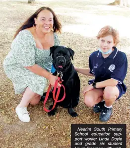  ?? ?? Neerim South Primary School education support worker Linda Doyle and grade six student Laura Freeman with wellbeing dog Bazza, an 11 month old Labrador.
