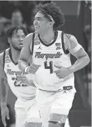  ?? MARTIN/JOURNAL AND COURIER ALEX ?? Marquette's Stevie Mitchell had 16 points, four rebounds, three assists, three steals and a career-high three blocks against Western Kentucky.