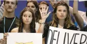  ?? AP ?? Activists Samira Ghandour, left, and Luisa Neubauer demonstrat­e Saturday at the U.N. Climate Summit.