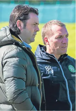  ?? Picture: SNS Group. ?? Former Dundee boss Paul Hartley joined Celtic manager Brendan Rodgers at yesterday’s training session at Lennoxtown.