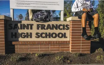  ?? Stephen Lam / The Chronicle ?? St. Francis High School in Mountain View is being sued by exstudents and their families who say the teens were wrongly forced to withdraw after a photo of them in acne masks circulated.