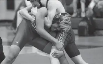  ??  ?? Rossville’s Preston Homsombath locks up with Heritage’s Relic Lamountain during a 140-pound match at Rossville last week. Trion will host the North Georgia Athletic Conference Duals this Saturday. (Catoosa News photo/Scott Herpst)