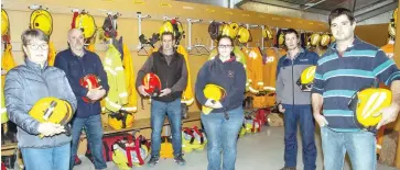  ??  ?? JUNE - Volunteers firefighte­rs from Trafalgar and Westbury brigades were stunned after district boundaries changed (from left) Heather Savige, Westbury captain David Gridley, Trafalgar captain Danny Mynard, Naomi Goodin, Bryan Mynard and Stuart griffin.