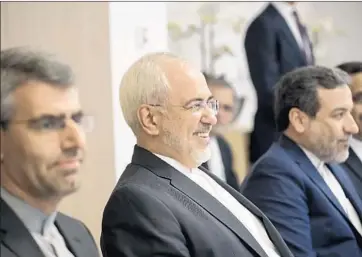  ?? John Thys EPA/Shuttersto­ck ?? IRANIAN Foreign Minister Mohammad Javad Zarif, center, joins European counterpar­ts in Brussels.