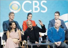  ?? Chris Pizzello Invision / Assocaited Press ?? SHEMAR MOORE, front and center, and other cast members of the new series “S.W.A.T.” on CBS answer questions during the press tour in Beverly Hills.