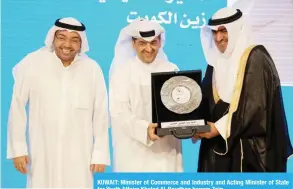  ??  ?? KUWAIT: Minister of Commerce and Industry and Acting Minister of State for Youth Affairs Khaled Al-Roudhan honors Zain.