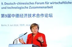  ??  ?? German Chancellor Angela Merkel delivers a speech during the German-Chinese Forum for economic cooperatio­n in Berlin, Germany July 9. — Reuters photo