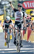  ??  ?? Leading way in: Ireland’s Dan Martin is rewarded after mounting a solo attack