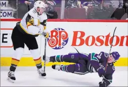  ?? Anne-marie Sorvin USA Today ?? Knights defenseman Brayden Mcnabb, left, finishes a check against Canucks forward Brock Boeser in their game Nov. 16 at Rogers Arena in Vancouver, Canada.