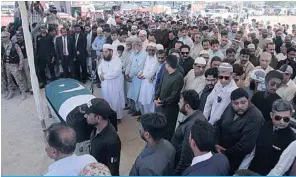  ??  ?? KARACHI: Relatives, residents and government officials offer funeral prayers for slain Pakistani exchange student Sabika Sheikh following her body’s arrival from the United States yesterday. —AFP