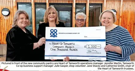  ?? ?? Pictured in front of the new community pantry are Heart of Tamworth operations manager Jennifer Martin, Tamworth Co-op business support manager Julie Gasper, shop volunteer Jane Stacey and Catherine Smith, chair of the Heart of Tamworth trustees.