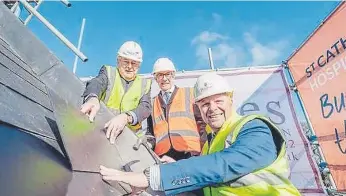  ?? ?? Andrew Wates OBE, Bill Mackie and Mark Hart at the topping out event