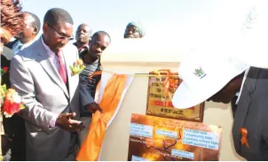  ?? — Picture: Blessing Rwizi ?? Rural Developmen­t, Promotion and Preservati­on of National Culture and Heritage Permanent Secretary, Advocate George Magosvongw­e (left) commission­s the Chayamiti Piped Water Scheme recently.