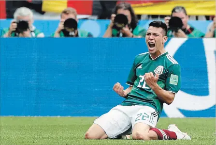  ?? ANTONIO CALANNI
THE ASSOCIATED PRESS ?? Mexico’s Hirving Lozano celebrates scoring his side’s goal against Germany at the 2018 World Cup in the Luzhniki Stadium in Moscow on Sunday.