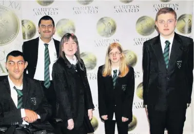  ??  ?? Award winners
Rutherglen High Pupils at the Caritas Awards