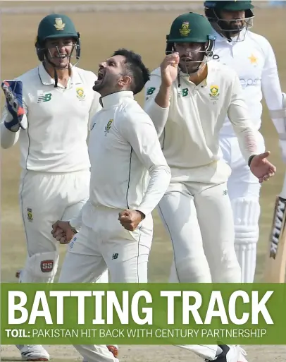  ?? Picture: AFP ?? BREAKTHROU­GH. Proteas spinner Keshav Maharaj celebrates after taking the wicket of Pakistan’s Azhar Ali during the first day of the second Test in Rawalpindi yesterday.