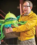  ?? ?? Feed me now: Oliver Mawdsley as Seymour, with his hungry plant