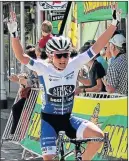  ??  ?? TOP WOMAN: Anriette Schoeman celebrates winning the Timbercity Cycle Tour