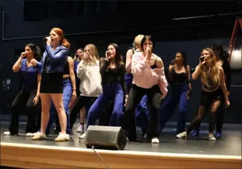  ?? COURTESY CHELMSFORD PUBLIC SCHOOLS ?? The Crescendos rehearse in the Carl J. Rondina Performing Arts Center at Chelmsford High School back in March. The group has advanced to the ICHSA Finals and will compete against the top high school a cappella groups in the country this weekend.