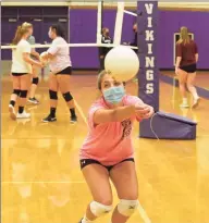  ?? Matthew Brown / Hearst Connecticu­t Media ?? Westhill's Vana Servos wears a protective mask during volleyball practice in Stamford on Monday.