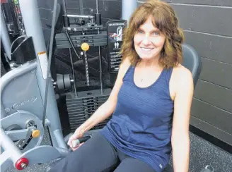  ?? Peter Simpson ?? A nurse at South Shore Regional Hospital, Wanda Robar takes a breather from using the leg extension machine at Lynds Den Health and Fitness Centre. Wanda finds that working out at least three times a week makes her feel better and the exercise is a great stress reliever.